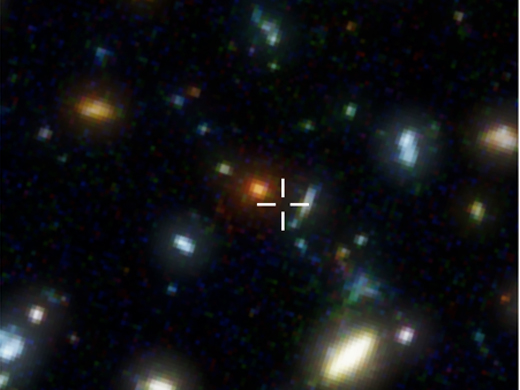 Die Position von HDF850.1 im "Hubble Deep Field". Das Kreuz markiert die Position (durch (Sub)Millimeter-Beobachtungen bestimmt) der Galaxie, optisch ist die Galaxie aufgrund der verdunkelnden Wirkung des Staubes nicht sichtbar. 