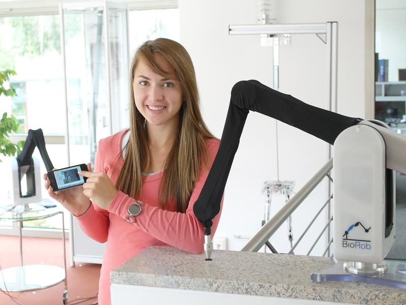 Test of the „BioRob“ arm with a smart phone, which would not exist without MEMS.  With MEMS2015 only, MEMS devices can be developed, which are indispensable in future as a core of (robot) systems.