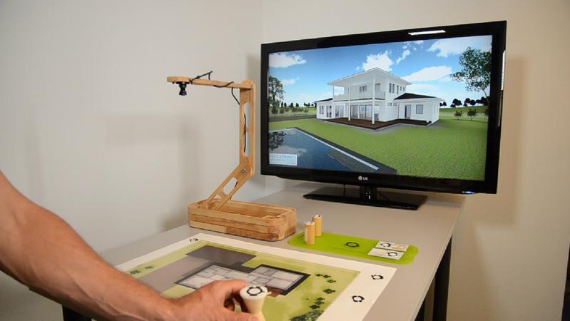 Echtzeit-3D-Simulation: Der Steuerungsmarker wird direkt am Grundrissplan bewegt, die jeweilige Perspektive auf das Gebäude wird am Bildschirm sichtbar – ganz ohne den Einsatz einer Maus
