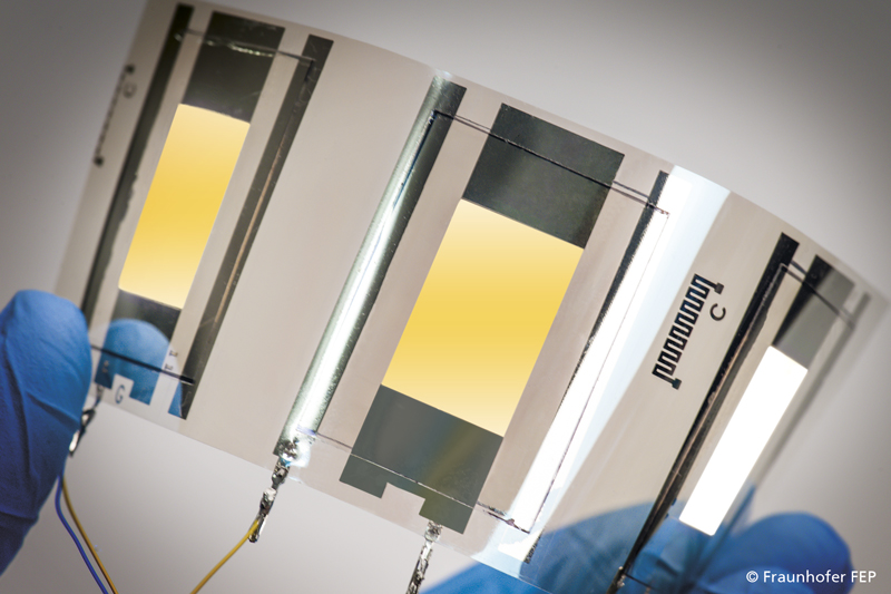 Flexible OLED of Fraunhofer COMEDD, built upon and encapsulated with functional films of Fraunhofer POLO