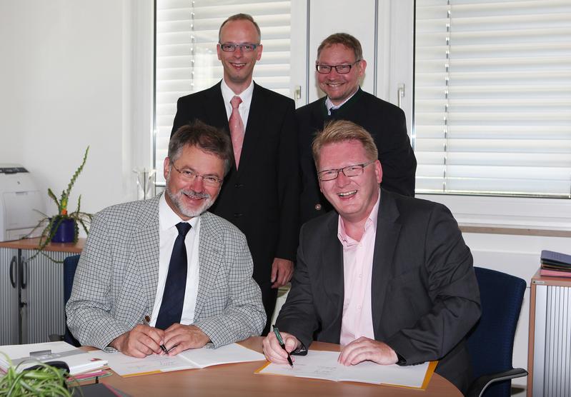 Rektor Jürgen Schröder, Prof. Martin Haag, Prof. Wendelin Schramm und Prof. Christoph Igel (v.l.)