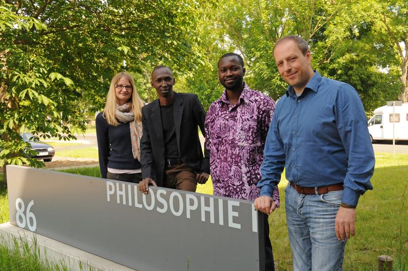 Forschen über Klimawandel und Landnutzung in Afrika (von links): Katharina Stein, Jean-Bosco Benewinde Zoungrana, Gerald Forkuor und Michael Thiel.