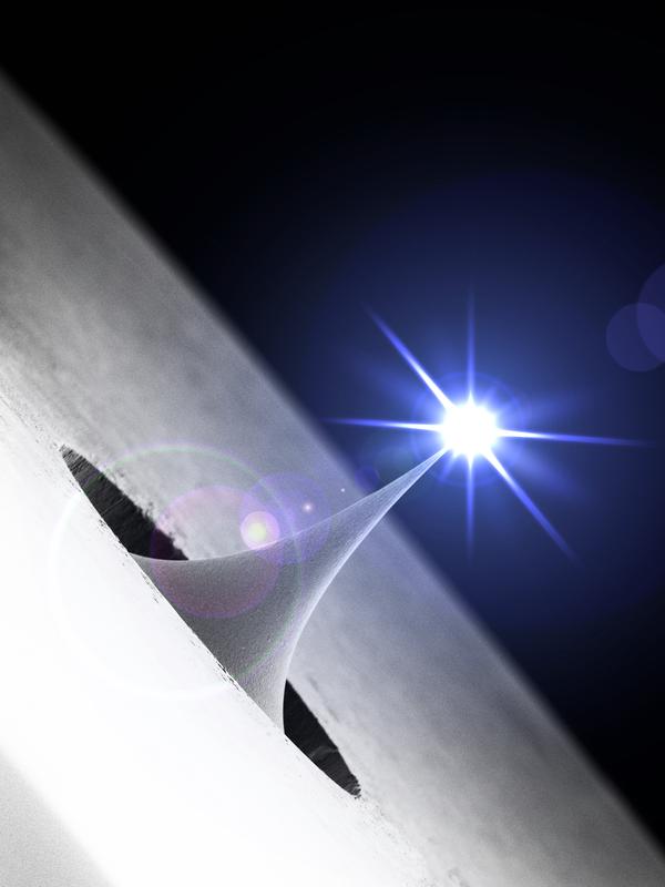 Die ultrakurzen Elektronenpulse für die Untersuchung molekularer Filme werden mit Laserlicht am Ende einer nanoskopisch kleinen Metallspitze erzeugt.