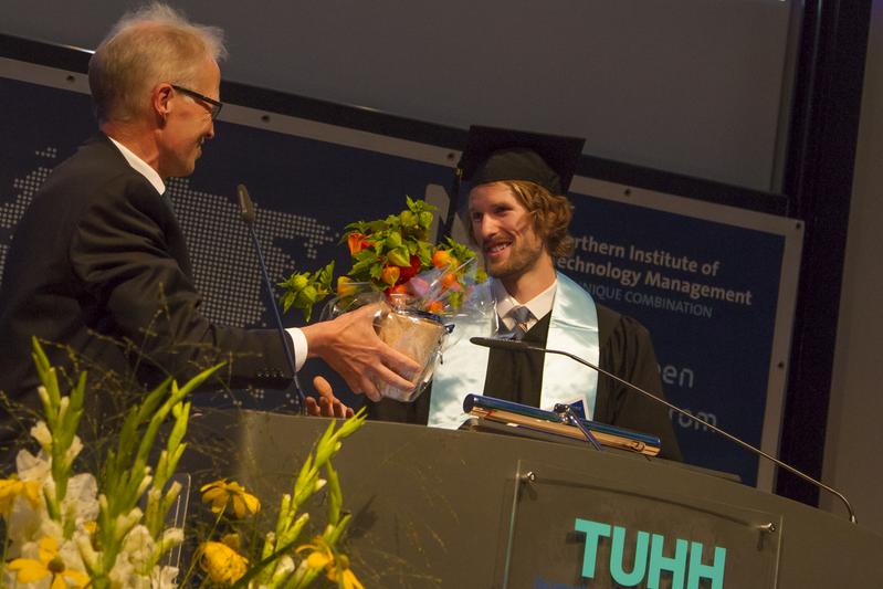 Prof. Otto von Estorff, President at NIT, congratulates Andrew Toth on DAAD Award 2014