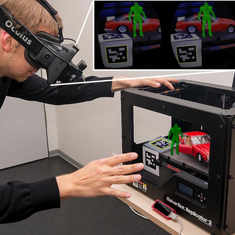 Christoph Beckmann, Mitarbeiter am Lehrstuhl für Mensch-Computer-Interaktion, testet FabAR, ein Werkzeug zum interaktiven Erstellen von Modellen im 3D-Drucker.