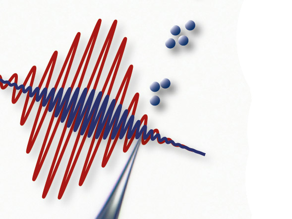 Laserpulse werden auf eine Metallspitze geschossen und lösen Elektronen heraus. 