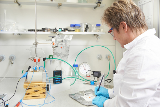 The use of an appropriate catalyst ensures the electrochemical synthesis of ethylene from carbon dioxide and water; otherwise electrolysis produces only hydrogen.