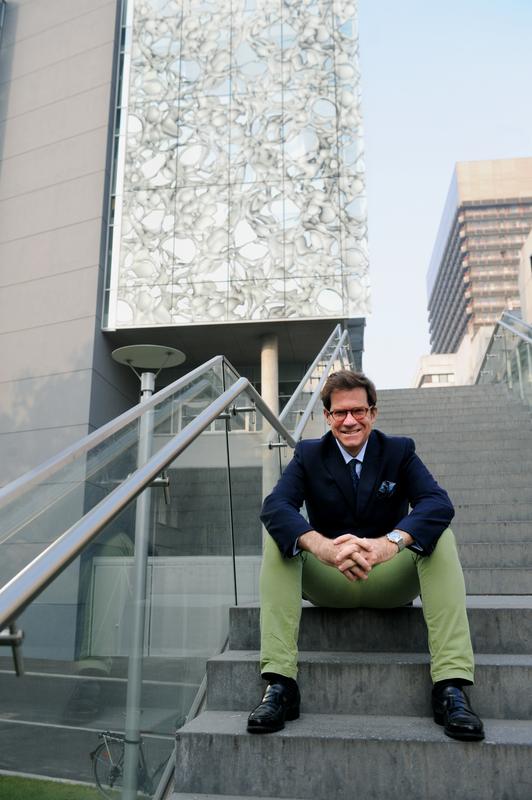 Giulio Superti-Furga in front of CeMM building 