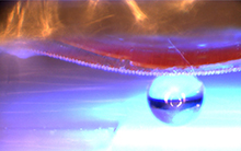 When illuminated with UV light, the intelligent material with the adhesive surface can transport three-dimensional objects (here, a 1 millimetre diameter glass sphere).