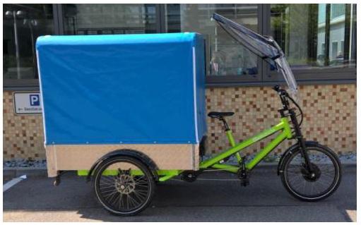 Ein Lastenfahrrad kann große, schwere Gegenstände transportieren, ist aber schwerfällig und benötigt etwas Übung. 