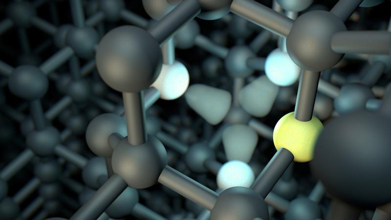 Im nahezu perfekten Gitter gibt es Stellen an denen ein Kohlenstoffatom zwischen den benachbarten Atomen (weiß) fehlt und daneben ein Stickstoffatom (gelb) eingebaut ist. 