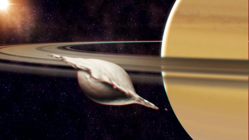 Entstehung von Atlas, einem der kleinen, inneren Monde des Saturns. Seine flache, ravioliartige Form kam bei der Kollision und Verschmelzung zweier gleich grosser Körper zustande.