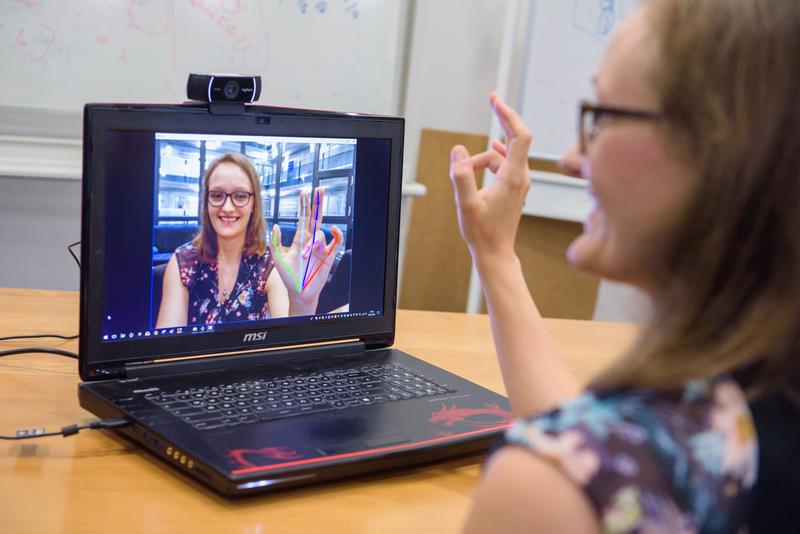 Franziska Müller, Max Planck Institute for Informatics, has developed a software system that requires only the built-in camera of a laptop to produce a real-time 3D model of a moving hand. 