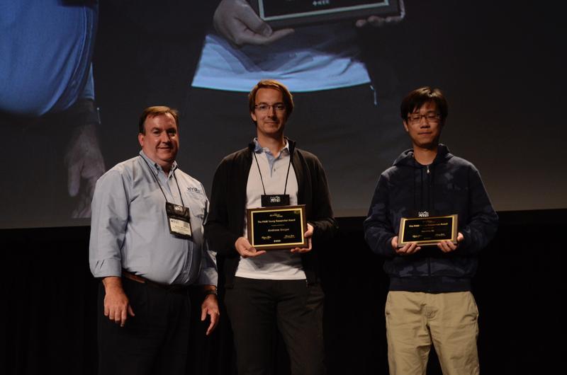 Andreas Geiger (middle) receives the most prestigious award in the field of Computer Vision for a young researcher.