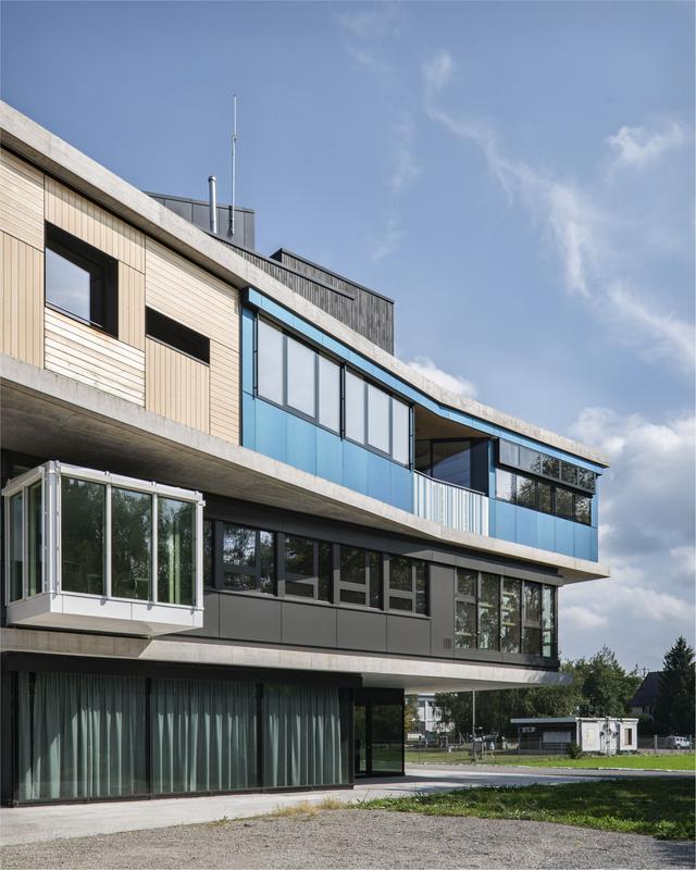 The blue-green facade of the “SolAce” unit at NEST. 