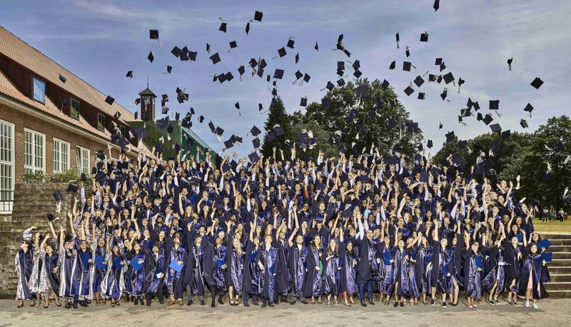 Festive graduation at Jacobs University with the traditional hat toss.