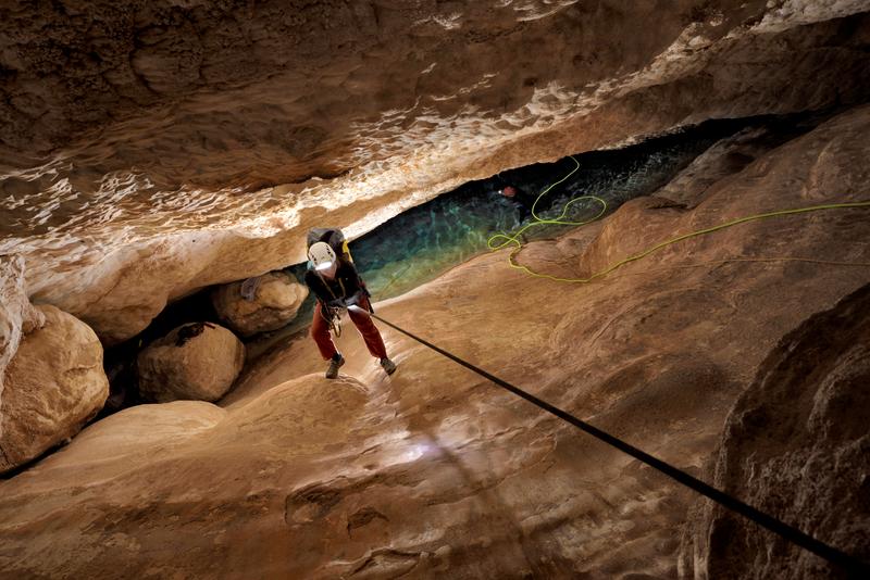 Kathleen Wendt rappels down to the narrow lower chamber in Devils Hole 2 cave, part of the Devils Hole system. 