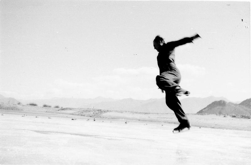 Harrer ice-skating behind the Iron Hill in Lhasa.