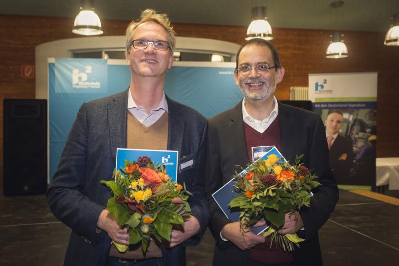 Bei der Vergabe des Forschungspreises: Prof. Dr. Matthias Morfeld und Prof. Dr. Michael Herzog (v. l.)