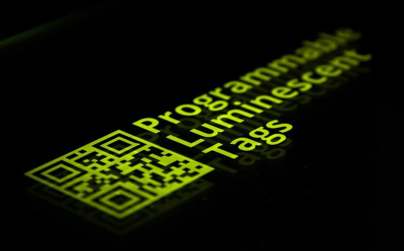 A luminescent tag, contactless printed onto a plastic foil. The light emitting layer is thinner than a human hair. The imprint can be erased and replaced by another pattern.