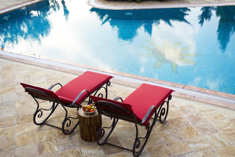 Relax at the pool: Adults are able to balance the importance and attainability of their goals. 