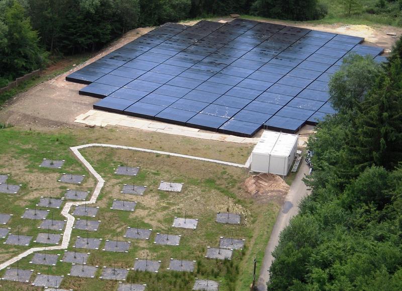 LOFAR station Effelsberg, shown from 50 m above ground. In front: LOFAR lowband antennas (LBA) for 10-80 MHz, in the back: LOFAR highband antennas (HBA) for 110-240 MHz.