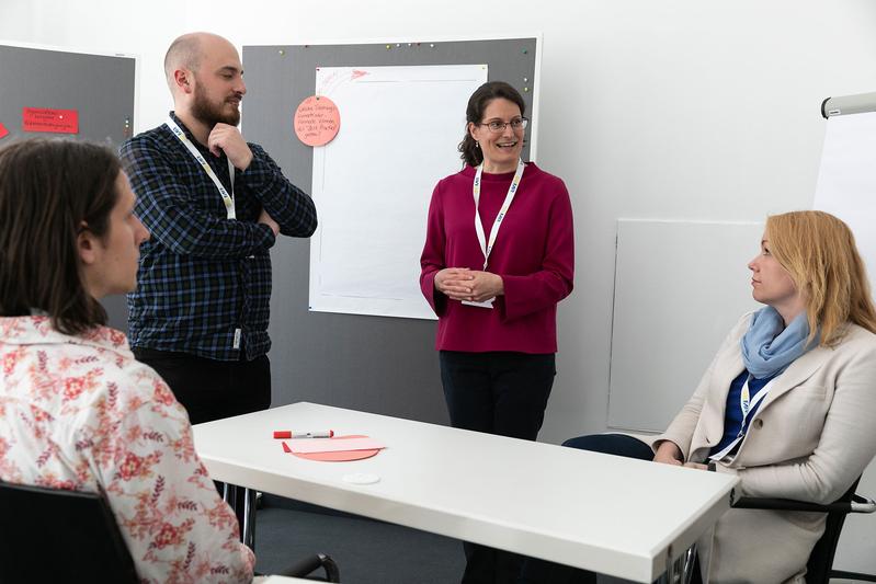 Workshop participants discussing training formats for FAIR research data management.