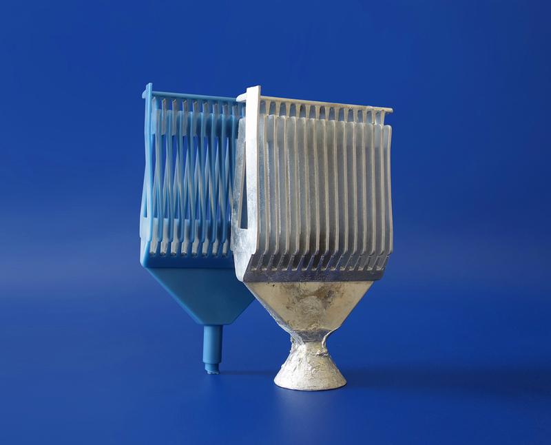 Release agent-free sprayed wax part and cast aluminium coil. 