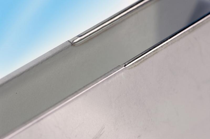 Partially laser-rounded sheet edges made of stainless steel (sheet thickness 1.5 mm).