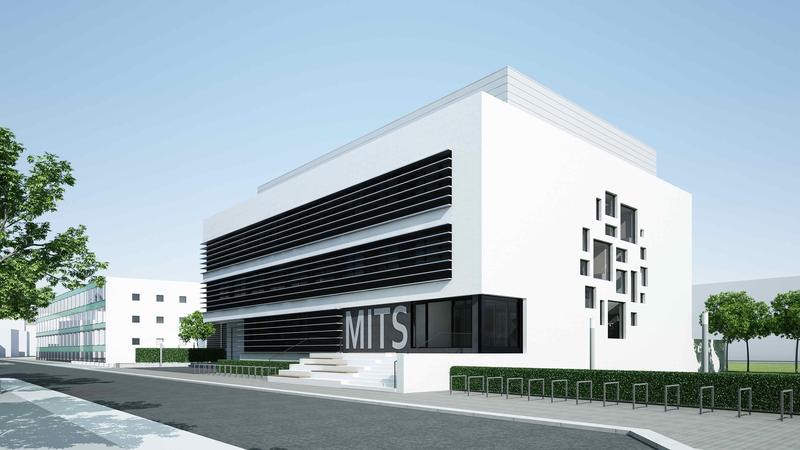 Der runde Fassadenausschnitt symbolisiert einerseits den im MITS weiterentwickelten Bioreaktor und gibt zudem Einblick in die Geschäftigkeit im Inneren des Gebäudes. 