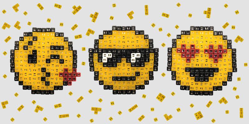 Quadrupolmodule lassen sich zu flächigen Objekten zusammenfügen, auch zu «Pixel-Art»-Emojis wie diesen.