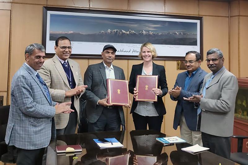 Prof. Frommer’s associate, Dr. Sarah M. Schmidt (fourth from left) accepts the document signed by the Indian partners at ICAR in New Delhi; third from left Dr. Mohapatra, Director General ICAR.
