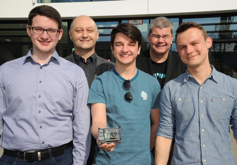 Bernd Finkbeiner  and Andreas Zeller (back) with the inventors of the "Bitahoy Watchdog“: Alexander Fink, Marius Bleif and Roman Tabachnikov (front from left to right)