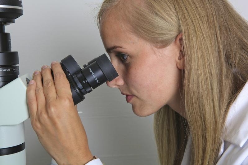 Student with microscope