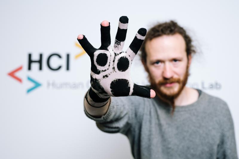 Polymerized glove that can be used to digitally capture hand movements. 
