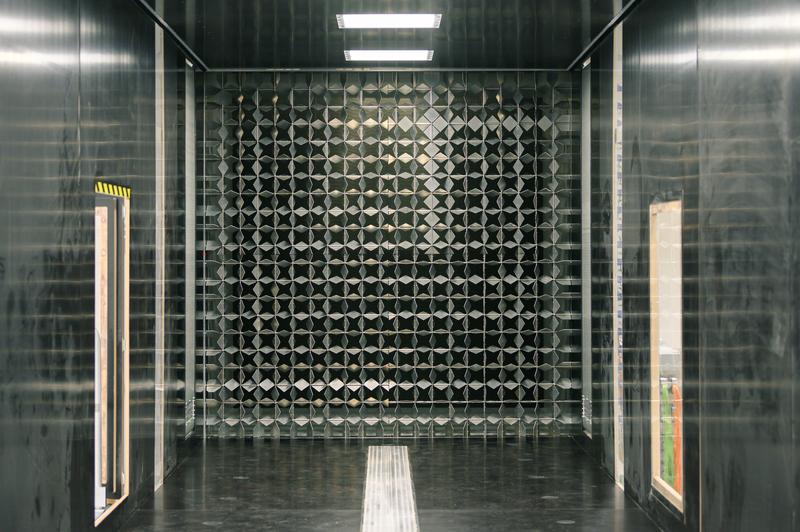 The active grid in the wind tunnel can stir up air flows to create realistic storm turbulence. 