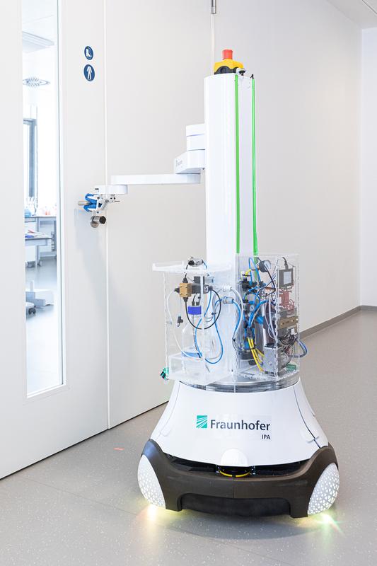 The mobile cleaning and disinfection robot DeKonBot navigates autonomously to critical objects such as door handles and disinfects them.