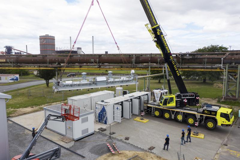 Der weltweit leistungsstärkste Hochtemperaturelektrolyseur wird in Salzgitter angeliefert. Die PTB und die Salzgitter Flachstahl GmbH arbeiten zusammen, um eine präzise Mengenmesstechnik für den damit produzierten Wasserstoff zu entwickeln.