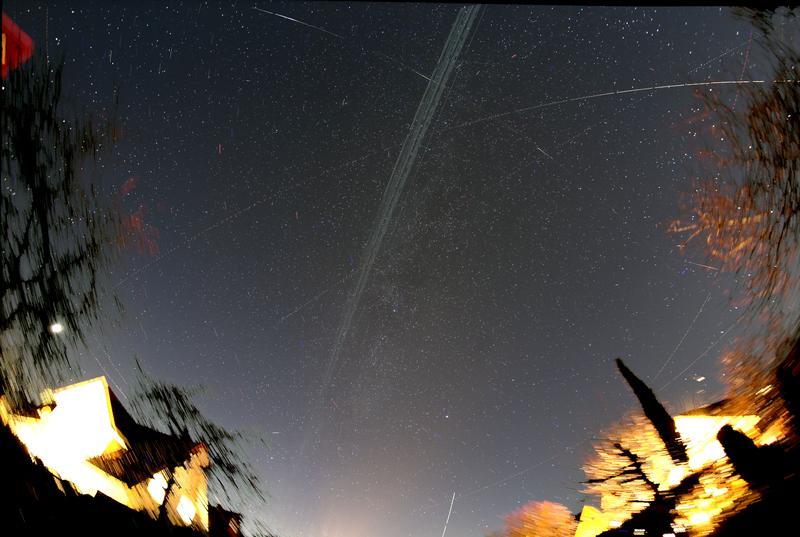 Satellites reflect sunlight and cause streaks in the starry sky in longer-exposure images. 