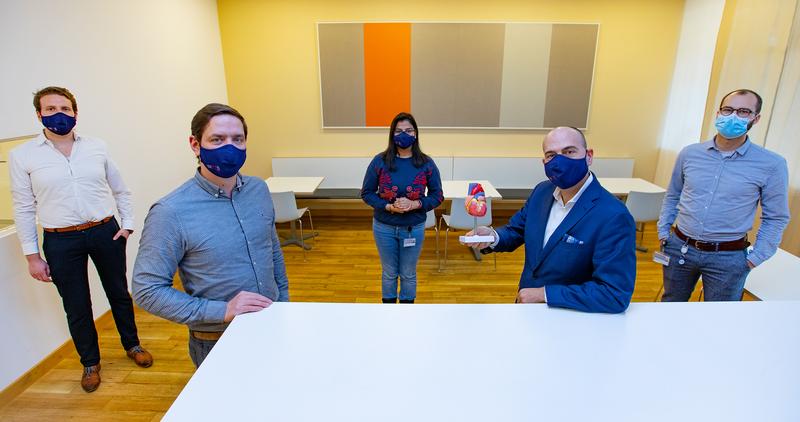  Dr Anselm Derda, Dr Christian Bär, Dr Ankita Garg, Professor Dr Dr Thomas Thum (with a model of a heart) and Dr Benjamin Seeliger. 