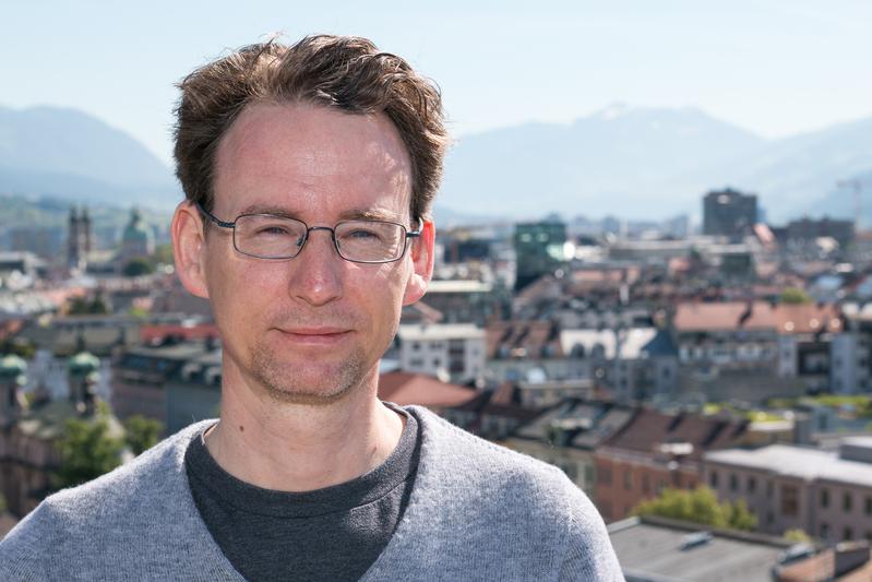 Thomas Karl studies the atmosphere above the rooftops of Innsbruck.
