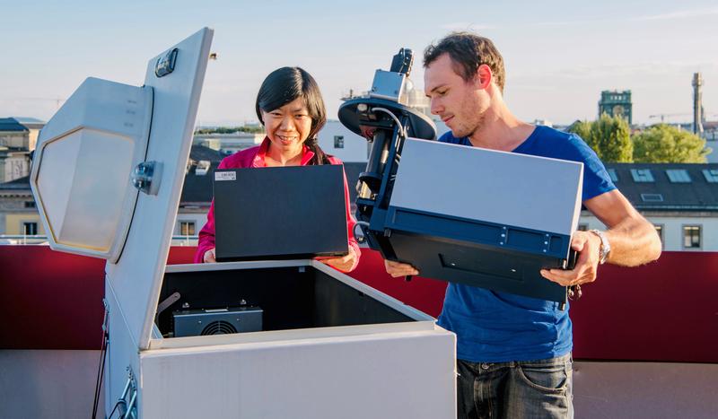 Jia Chen and Florian Dietrich at work on one of their sensors to study the atmosphere for greenhouse gases.