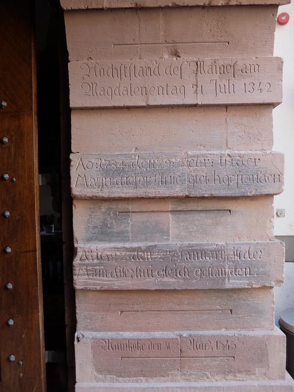 Flood marks in Würzburg at the archway of the southern entrance to the town hall