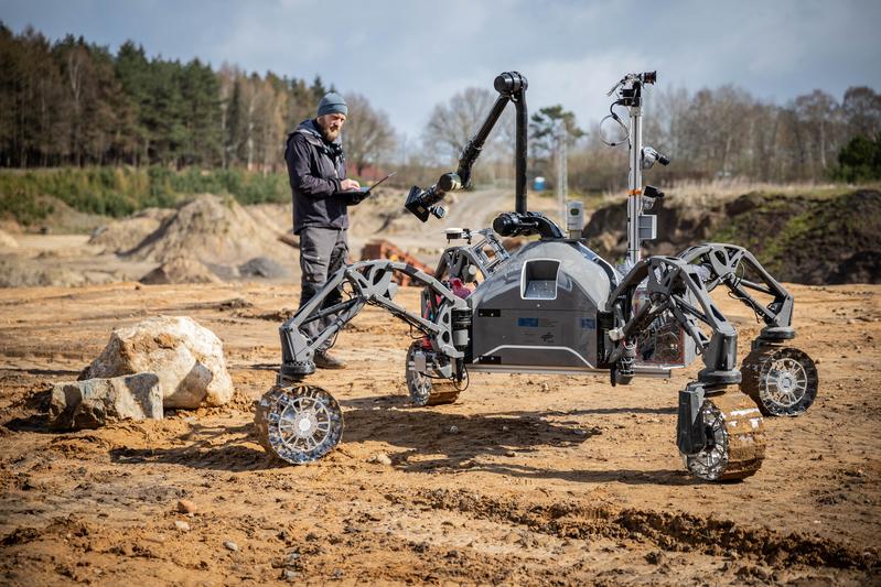 DFKI project manager Dr. Florian Cordes with SherpaTT during the field tests