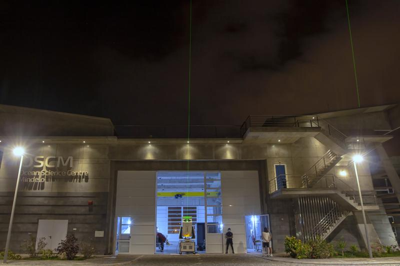 Two lidar instruments are currently in operation at OSCM in the port of Mindelo: the National Observatory of Athens (NOA) measures with EVE from the ground (centre) and TROPOS with PollyXT from the roof (right).