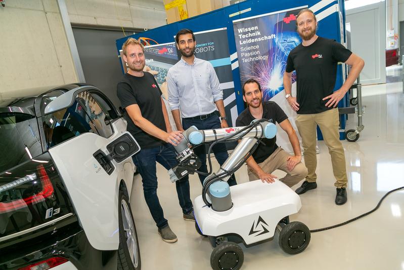 The brains behind the autonomous mobile e-charging robot: (from left) Bernhard Walzel (TU Graz),  Ehsan Zadmard (ALVERI), Konstantin Mautner-Lassnig (ARTI Robots) and Helmut Brunner (TU Graz). 