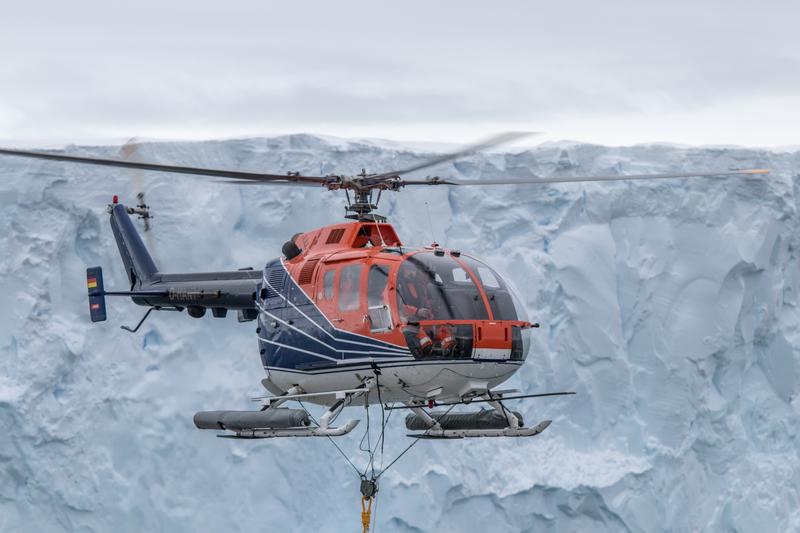 Geophysical measurements with a magnetometer being towed with RV Polarstern's board helicopter. 
