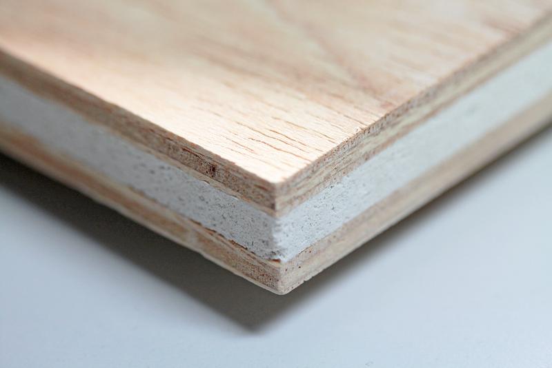 Non-combustible hybrid plywood panel.