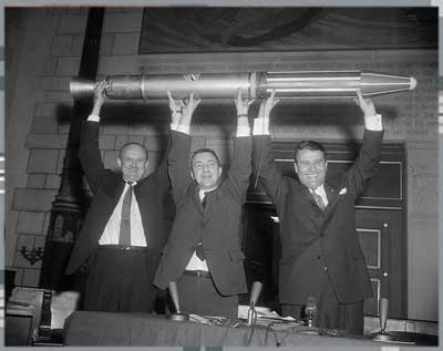 From left to right: Dr. William H. Pickering, Director of JPL; Dr. James Van Allen (after whom the Van Allen Belt was named; recently deceased); and Dr. Wernher von Braun raise a full-size model of America's first satellite, Explorer I, above their heads following a successful launch on January 31, 1958. This satellite discovered the radiation belts - it was a long time ago, but we still have some significant unknowns still!