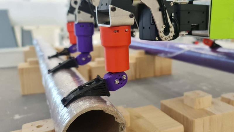Die speziell gefertigten Roboterfüße passen sich an rundliche Oberflächen an und bieten so festen Halt. 